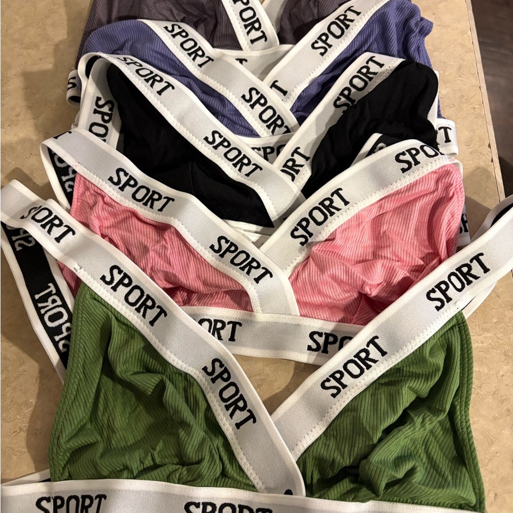 5 Sports Bras in Black, Green, Pink, Purple & Gray. Size small, new but no tags